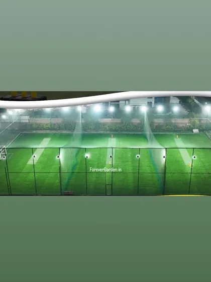 An evening shot of the illuminated sports ground, showing how our turf provides a great playing experience day or night.