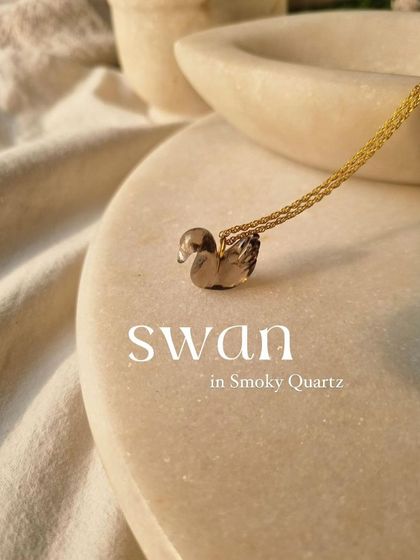 Another view of the Smoky Quartz swan pendant. I designed this piece to be a symbol of grace that also helps to neutralize negative vibrations.
