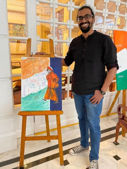 With my completed painting for the Independence Day event at ITC Windsor.