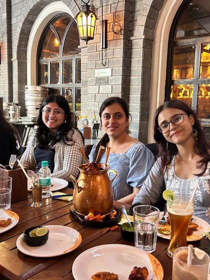 Volunteers enjoying a meal together. These bonding sessions are a chance to share experiences and strengthen our community.