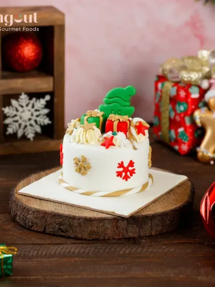 This Christmas Special Plum Cake is topped with a beautiful marzipan icing design. The rich fruit cake combined with the smooth, sweet marzipan makes it a truly royal festive treat.