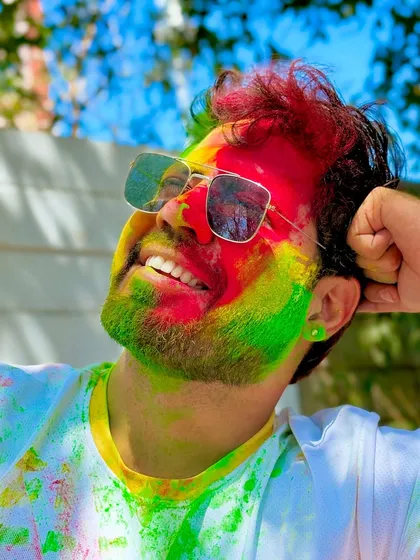 Though this is from a Holi celebration, this is the kind of colorful, messy fun I love to bring to Haldi events too. It's all about letting loose!