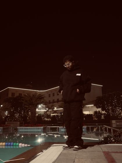 Night vibes by the pool, still repping Control. The grind never stops.