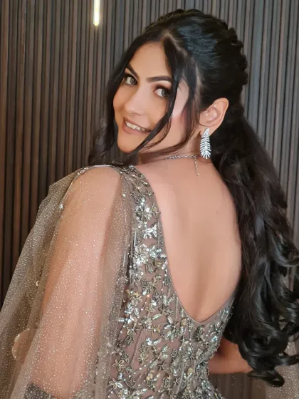 A beautiful back view of my engagement bride, showing off her elegant hairstyle and the stunning back of her gown.