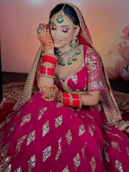 A final portrait of the magenta bride. The makeup is both modern and traditional, perfect for today's bride.