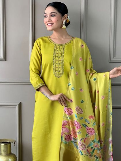 This lemon viscose chanderi kurta is so fresh and vibrant. The heavy thread embroidery and printed dupatta make it a cheerful addition to your ethnic wardrobe.