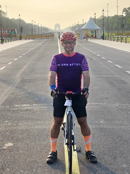 A frontal shot on Kartavya Path with India Gate in the background.