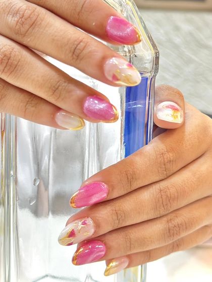 We love creating unique, artistic designs like this one. The combination of pink, sheer, and gold is both elegant and trendy.