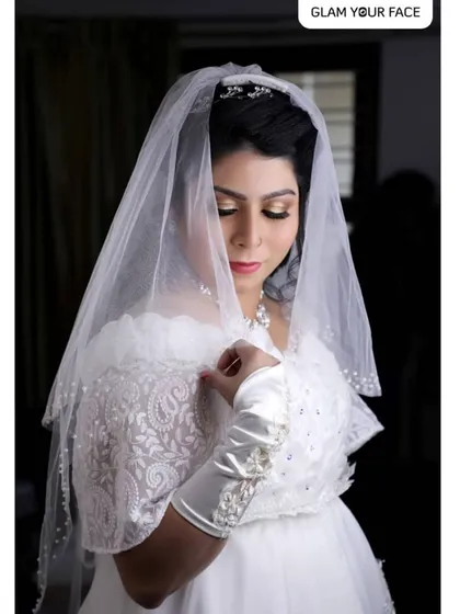 For my Christian brides, I love creating looks that are absolutely divine and ethereal. This makeover features a soft, shimmering eye and a classic pink lip, designed to complement the elegance of a white gown and veil. It’s all about timeless beauty.