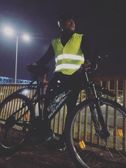 Cycling is an excellent cardio workout that helps shed weight and lose belly fat. Here I am on a night ride, getting my own cardio in.