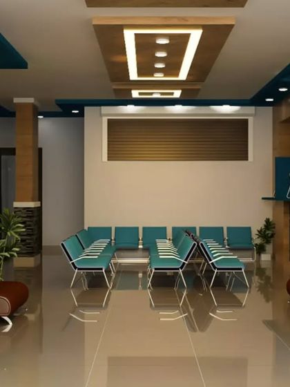 This corporate waiting lounge was designed for comfort and style. The symmetrical layout, reflective flooring, and sophisticated false ceiling with integrated lighting provide a polished and professional environment for visitors.
