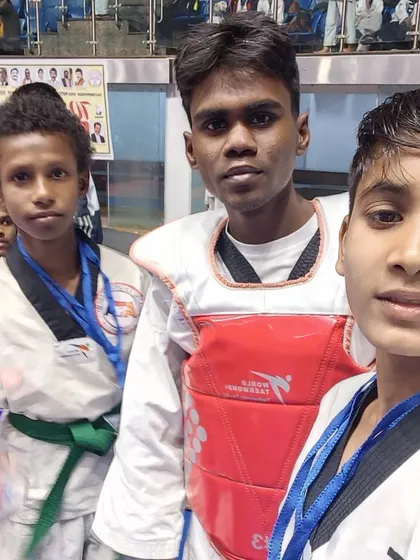 A selfie with some of our fighters after their matches, capturing the experience.