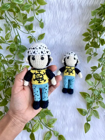 Here is Trafalgar Law, another character from One Piece. I paid close attention to his signature spotted hat and even his tiny ear piercings to make this anime replica authentic.