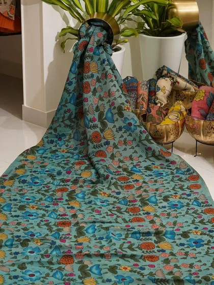 This is a glimpse into my Kalamkari Edition, featuring a wide array of hand-painted dupattas and fabrics from the Indralokam series. Each piece is a unique story, available for you to customize into your dream outfit.