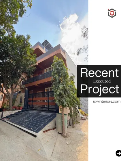 The exterior of a modern villa project in Vasundhara, Ghaziabad. The design features clean lines, a mix of materials, and a grand entrance.