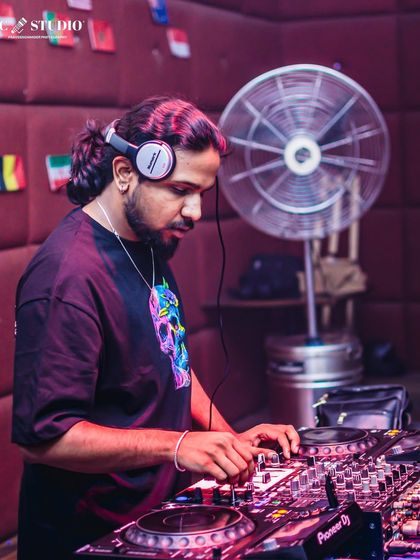 These shots capture me in my element, from different angles and at various events. Each one is a glimpse into my life as a music maker, focused on the craft and connecting with the crowd.