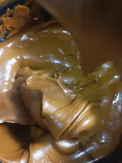 Another look at the silky smooth texture of my henna paste. I mix it until it reaches this perfect consistency, ensuring a flawless application every time.