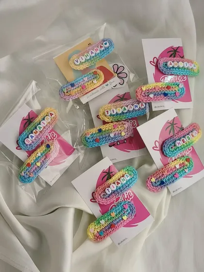 A whole collection of our unicorn name clips ready to be sent out. I love how the pastel rainbow yarn looks with all the different names.
