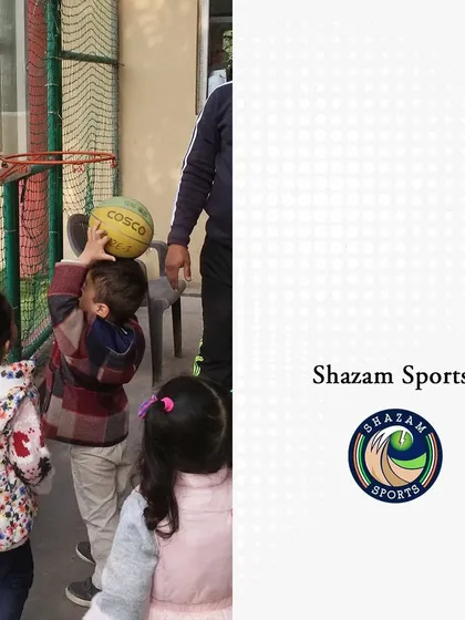 Our partnership with Shazam Sports brings professional coaching to our camp. Here, a child learns the basics of basketball, building skills and confidence with expert guidance.