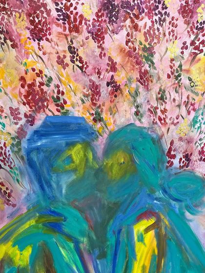 The finished wedding gift painting. The abstract figures of the couple are enveloped in a cloud of colorful blossoms, creating a romantic and dreamlike scene.