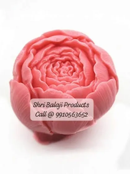 A close-up of a pink peony flower soap, showing the intricate layers of petals. My high-quality silicone molds are designed to capture this level of detail perfectly.