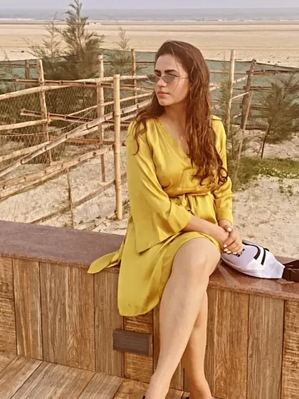 Here, I'm showing how this versatile yellow dress can be styled for a relaxed moment. It's the kind of piece I help clients find for their travel wardrobe: stylish, practical, and easy to pack.
