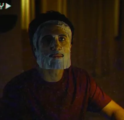 A quirky and fun moment from the Valentine's Day film. Styling for commercials often involves creating memorable visuals that tell a story quickly, like this playful face mask scene.