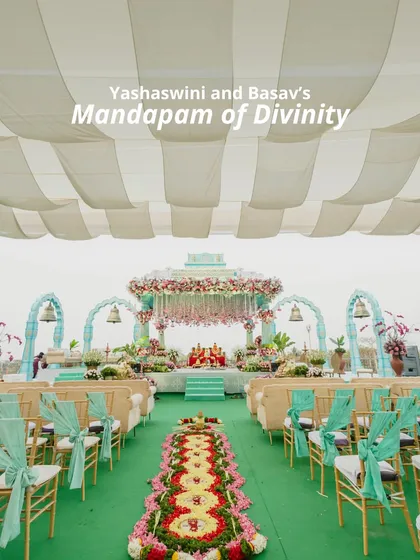 Yashaswini and Basav's Mandapam of Divinity was a vision of serenity. A striped canopy, floral-draped arches, and a vibrant aisle of petals created a beautiful and sacred space for their ceremony.