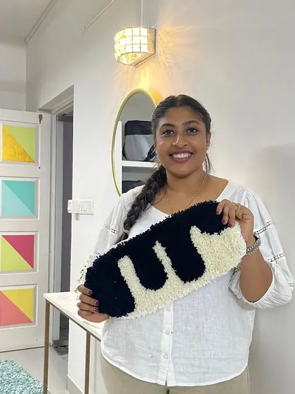 A beautiful abstract rug with a dripping paint effect. This piece shows how you can play with shapes and colors to create something truly unique and artistic.