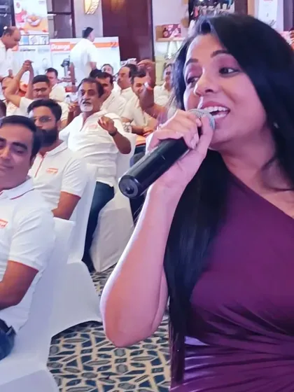 Interacting with the dealers during the Orange Cookware event. I make it a point to move through the audience, making personal connections and ensuring everyone is engaged, not just watching from their seats.