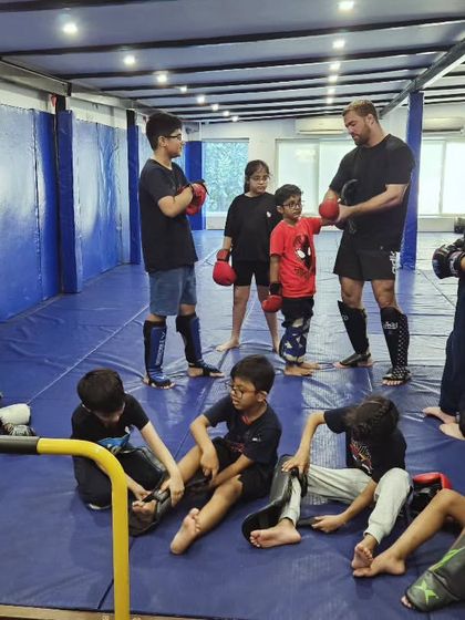 A typical class scene. Kids are learning, resting, and getting ready for the next drill. It's all about consistent effort, listening to your coaches, and having a good time.