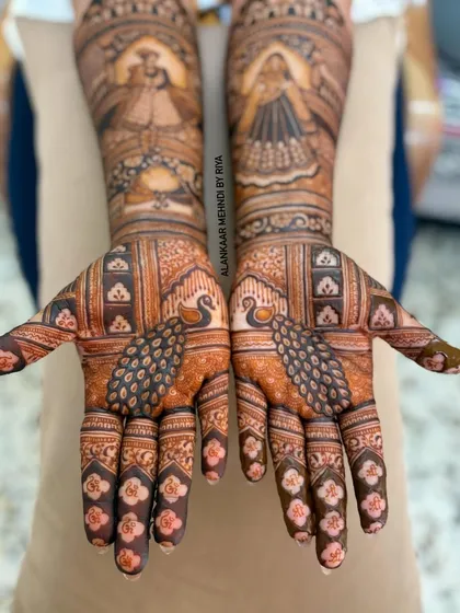 The full view of both hands, showing how the individual portraits and motifs come together to create a cohesive and grand bridal statement.