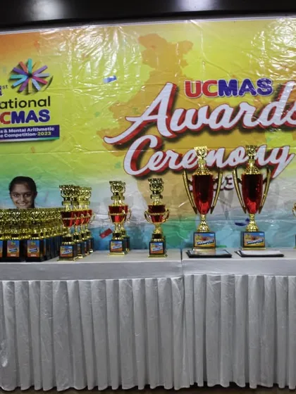 The stage is set for the 21st National UCMAS Awards Ceremony. The collection of trophies on display represents the high level of achievement and recognition that our national-level competitors strive for.