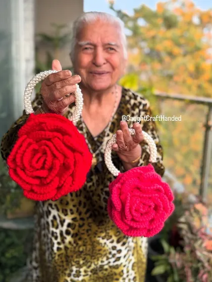 Dadi showing off two of our red Peony Bags. They are perfect for gifting or for a mother-daughter twinning moment.