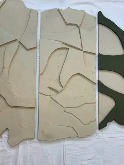 The separate components of the modular artwork laid out. This shows the complexity of the design and how the individual parts form a whole.
