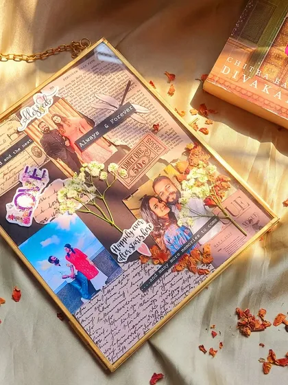Another example of our custom vintage frames. This one uses a scrapbook style with different paper textures, photos, and stickers to create a rich and layered collage of a couple's journey.