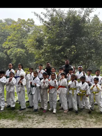 Our team of young karate students, ready and focused during their outdoor belt examination.