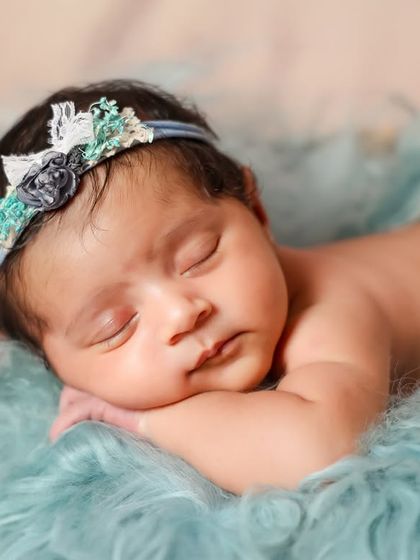 Pure innocence. This little one is sleeping on a cloud of soft blue fluff. I love using simple color themes to create a dreamy feel for newborn portraits.