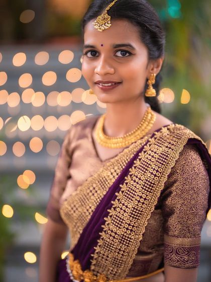 A lovely close up portrait. You can see the clean, fresh makeup that gives her a natural glow, perfect for a daytime wedding ceremony.