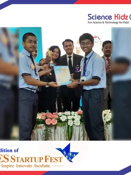 The award ceremony at the NES Startup Fest, where our students are receiving their trophy and certificate on stage. This is a powerful moment of recognition for their hard work.