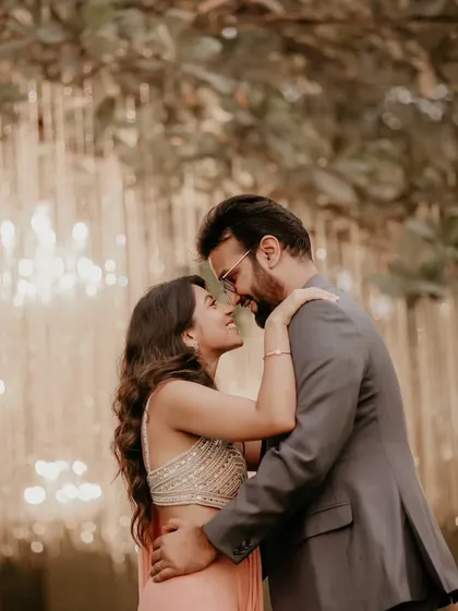 An intimate portrait with beautiful bokeh from the fairy lights. I love using the decor to create a magical, romantic atmosphere for couple photos.