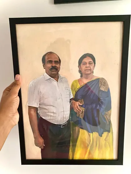 A framed A3 size oil painting of a couple, delivered to a client in Nagercoil. It took over 37 hours to complete this detailed piece.