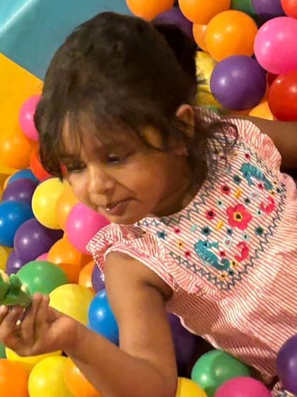 We recently completed a decade of spreading joy, laughter, and memories. This little one enjoying our ball pit represents the thousands of happy moments we've hosted.