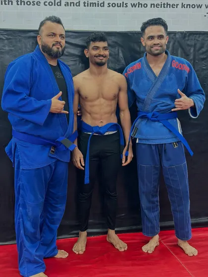 Three of our dedicated BJJ practitioners. The camaraderie and mutual respect in our grappling classes are key to everyone's growth.