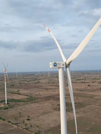 A wide-angle shot of our 180 MW Wind Solar Hybrid Project in Tamil Nadu. This project showcases our ability to navigate challenging weather conditions and complex logistics to deliver large-scale renewable infrastructure on schedule.