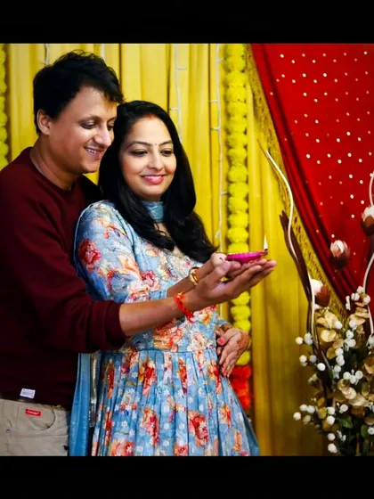 There is something so special about celebrating Diwali. This was a candid moment with my husband during our own festive photoshoot. I use warm lighting and traditional backdrops with props like diyas to capture the beautiful, intimate moments of celebration for couples and families.