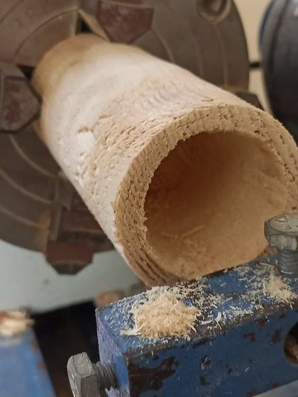 Another view of the hollowing process. You can see the wood shavings starting to build up as the inside is shaped.