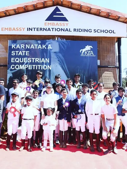 A group of proud winners at the Karnataka State Equestrian Competition. Our venue is designed to host large-scale events, complete with podiums and backdrops for memorable victory celebrations.