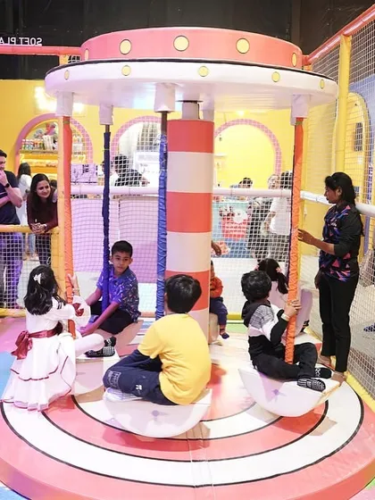 The kids' carousel is always a hit, offering a safe and delightful ride within our soft play area.