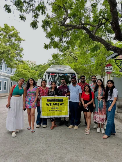 Our Pondicherry group standing by our traveler van, ready to explore the city.
